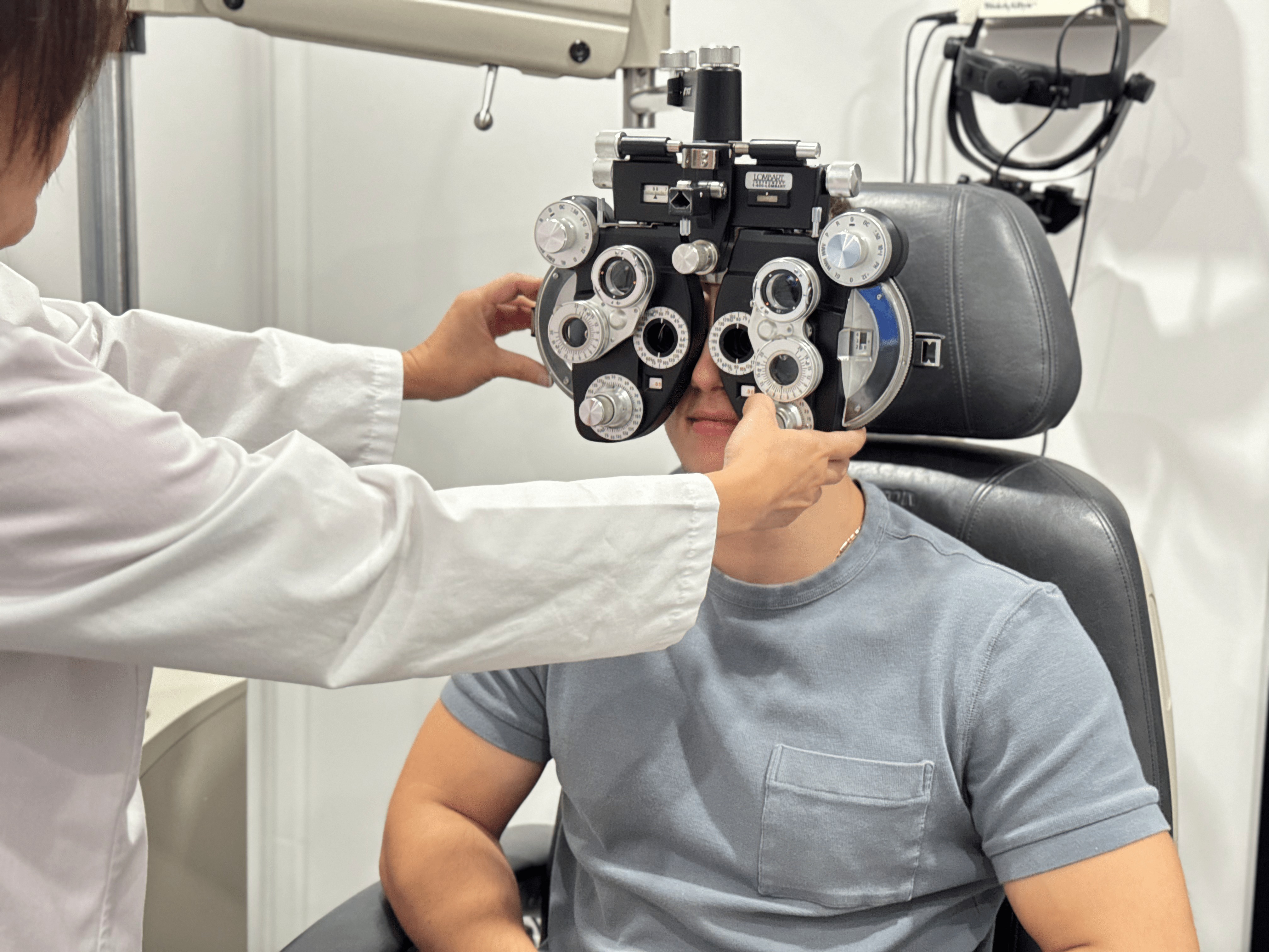 Eye examination with phoropter at M&N Optical